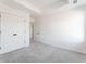 Bright bedroom with gray carpet, double closets and ensuite bathroom at 95 Wilder Ridge Way, Lawrenceville, GA 30044
