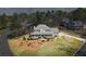 Well-kept home with spacious front yard, big wraparound porch and meticulously maintained grounds at 9549 Clear Lake Court, Douglasville, GA 30135