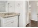 Bathroom featuring granite counter top, modern fixtures, and walk-in shower at 3129 Thrasher Cir, Decatur, GA 30032