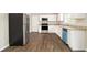 This kitchen has stainless steel appliances, granite countertops, and white cabinets at 3129 Thrasher Cir, Decatur, GA 30032