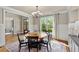 Formal dining room with a view of the backyard at 5330 Cole Creek Ln, Cumming, GA 30040