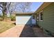 Backyard patio area and green exterior with access door; perfect for outdoor enjoyment and relaxation at 1019 Magbee Se Dr, Smyrna, GA 30080