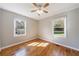 Bedroom featuring hardwood floors and a large window at 1019 Magbee Se Dr, Smyrna, GA 30080