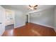 Bedroom with hardwood floors, closet and exterior door at 1019 Magbee Se Dr, Smyrna, GA 30080