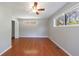 Bedroom featuring hardwood floors, closet, ceiling fan and natural light at 1019 Magbee Se Dr, Smyrna, GA 30080