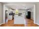 Bright and airy kitchen with stainless steel appliances, white cabinets, granite countertops and a central island at 1019 Magbee Se Dr, Smyrna, GA 30080