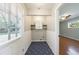 Convenient laundry room featuring storage cabinets, washer/dryer hookups and access to the outdoor space at 1019 Magbee Se Dr, Smyrna, GA 30080