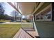 Inviting covered porch with classic white railings, providing a perfect spot for relaxing outdoors at 1019 Magbee Se Dr, Smyrna, GA 30080