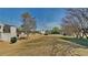 A large grass yard with a tree lined property line at 4688 Snap Creek Ln, Decatur, GA 30035