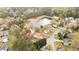 Aerial view showing property lines of a home by a pond with surrounding trees and residences at 1340 Summer Lake Ter, Loganville, GA 30052