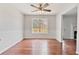 Dining room featuring hardwood floors, window views to the backyard, and decorative trim at 1340 Summer Lake Ter, Loganville, GA 30052