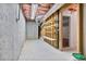 Basement storage area with open ceiling, exposed ductwork, and built-in shelving at 1340 Summer Lake Ter, Loganville, GA 30052