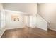 Bright living room with high ceilings, hardwood floors, and a view into the dining area at 1946 Glenwood Downs Dr, Decatur, GA 30035