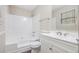 Bright bathroom featuring a shower-tub, modern vanity, a neutral color palette, and tiled floors at 3380 Saddleton Way, Douglasville, GA 30134