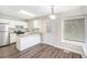 Bright eat-in kitchen with white cabinets, granite countertops, and stainless steel appliances for the home chef at 3380 Saddleton Way, Douglasville, GA 30134