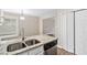 Kitchen featuring stainless steel sink, granite countertops, and a convenient dishwasher for modern living at 3380 Saddleton Way, Douglasville, GA 30134