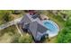 Aerial view of home with pool, driveway and manicured landscaping at 3510 Donegal Way, Snellville, GA 30039
