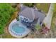 Aerial view showcasing a home's backyard pool and outdoor entertaining area at 3510 Donegal Way, Snellville, GA 30039