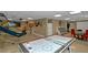 Finished basement area with entertainment and seating for social gatherings at 3510 Donegal Way, Snellville, GA 30039