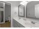 This bathroom features a double sink vanity, tile flooring, and a shower with a shower curtain at 3510 Donegal Way, Snellville, GA 30039