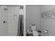 This bathroom features a tile shower, toilet, and grey accents at 3510 Donegal Way, Snellville, GA 30039