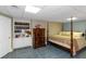 Bedroom with a four poster bed and built-in bookcase at 3510 Donegal Way, Snellville, GA 30039