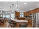 Modern kitchen with a breakfast bar, stainless steel appliances, and ample counter space at 3510 Donegal Way, Snellville, GA 30039