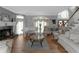 Elegant living room with a fireplace, piano, and comfortable seating arrangement at 3510 Donegal Way, Snellville, GA 30039