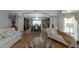 Elegant living room featuring hardwood floors, a cozy chaise lounge, and beautiful decor at 3510 Donegal Way, Snellville, GA 30039