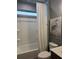 Bathroom with a tub and shower combo, featuring an art piece at 63 Aspen Way, Dallas, GA 30157