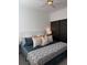 Bedroom featuring modern decor, a large bed, and a cozy atmosphere at 63 Aspen Way, Dallas, GA 30157