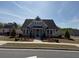 Charming exterior showcases manicured landscaping at 63 Aspen Way, Dallas, GA 30157