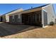 Home exterior with a screened porch and well-maintained lawn at 63 Aspen Way, Dallas, GA 30157
