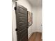 Hallway featuring gray doors and luxury vinyl plank flooring at 63 Aspen Way, Dallas, GA 30157