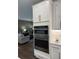 Modern kitchen featuring stainless steel appliances and white cabinetry at 63 Aspen Way, Dallas, GA 30157