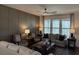 Spacious living room featuring stylish furniture and large windows overlooking a beautiful outdoor scenery at 63 Aspen Way, Dallas, GA 30157