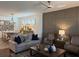 Cozy living room open to dining area, features stylish decor, and ample seating at 63 Aspen Way, Dallas, GA 30157