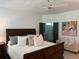 Main bedroom featuring a ceiling fan, sitting area, and bathroom access at 63 Aspen Way, Dallas, GA 30157