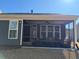 Screened-in back porch with comfortable seating and outdoor views at 63 Aspen Way, Dallas, GA 30157