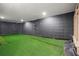 Basement Gym features rubber flooring, brick walls, recessed lighting, and workout equipment at 6710 Grayland Dr, Douglasville, GA 30135