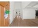 Bright foyer featuring hardwood floors, soaring ceilings, and a view into the open-concept living spaces at 6710 Grayland Dr, Douglasville, GA 30135
