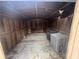 The interior of the backyard storage shed has shelving and lots of space at 3488 Richmond Se Dr, Conyers, GA 30094