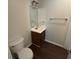Half bathroom featuring a vanity with wood-look flooring at 3839 Henry Ct, Acworth, GA 30101