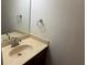 Bathroom featuring a sink with chrome fixtures and a large mirror at 3839 Henry Ct, Acworth, GA 30101