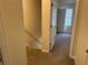 Hallway with carpet flooring and stairs at 3839 Henry Ct, Acworth, GA 30101