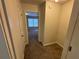 Hallway leading to a bedroom and a storage area at 3839 Henry Ct, Acworth, GA 30101