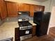 Modern kitchen featuring stainless steel appliances, beautiful countertops, and wood cabinets at 3839 Henry Ct, Acworth, GA 30101