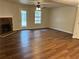 Spacious living room features a fireplace and wood laminate flooring at 3839 Henry Ct, Acworth, GA 30101
