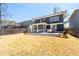 Spacious backyard with a patio, screened porch, and lawn, great for outdoor living at 4064 Comanche Dr, Tucker, GA 30084