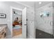 Bright bathroom with stylish glass shower, marble accents, and a modern aesthetic at 4064 Comanche Dr, Tucker, GA 30084